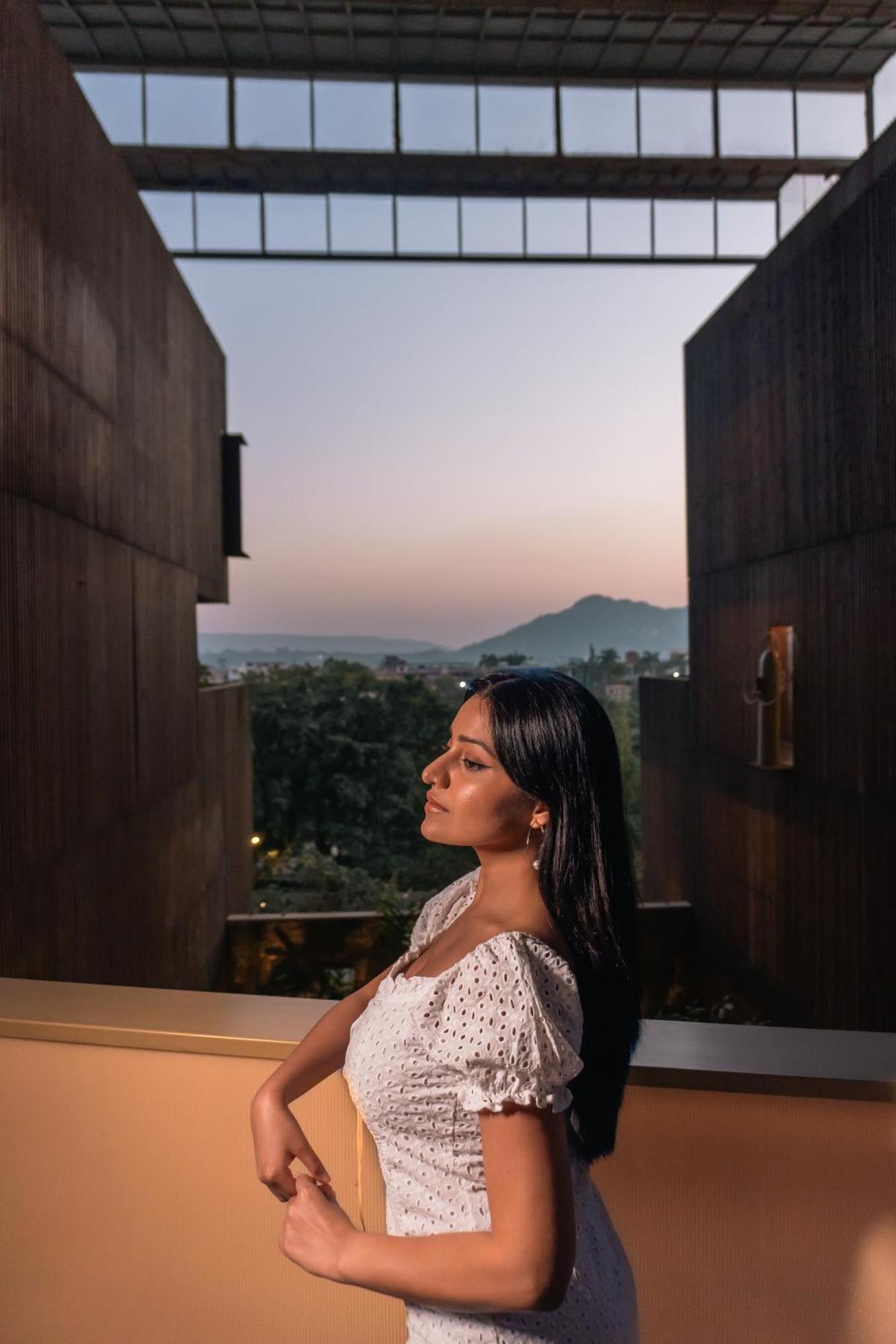 Radisson Resort And Spa Lonavla Zewnętrze zdjęcie A woman in contemplation